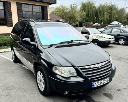 Черный Додж Рам Ван, объемом двигателя 2.5 л и пробегом 225 тыс. км за 5600 $, фото 1 на Automoto.ua