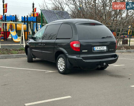 Черный Додж Рам Ван, объемом двигателя 2.5 л и пробегом 200 тыс. км за 2999 $, фото 1 на Automoto.ua