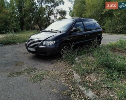 Черный Додж Рам Ван, объемом двигателя 2.5 л и пробегом 530 тыс. км за 3500 $, фото 1 на Automoto.ua