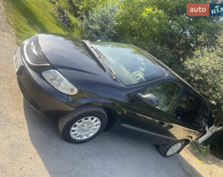 Черный Додж Рам Ван, объемом двигателя 2.5 л и пробегом 290 тыс. км за 3499 $, фото 1 на Automoto.ua