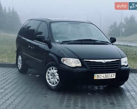 Черный Додж Рам Ван, объемом двигателя 2.5 л и пробегом 280 тыс. км за 3999 $, фото 1 на Automoto.ua