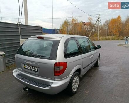 Серый Додж Рам Ван, объемом двигателя 2.5 л и пробегом 271 тыс. км за 5200 $, фото 1 на Automoto.ua