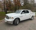Белый Додж RAM 1500, объемом двигателя 5.7 л и пробегом 250 тыс. км за 35000 $, фото 1 на Automoto.ua