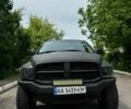 Черный Додж RAM 1500, объемом двигателя 5.7 л и пробегом 174 тыс. км за 23000 $, фото 1 на Automoto.ua