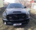 Черный Додж RAM 1500, объемом двигателя 5.7 л и пробегом 320 тыс. км за 14000 $, фото 1 на Automoto.ua