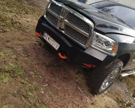 Черный Додж RAM 1500, объемом двигателя 5.65 л и пробегом 110 тыс. км за 18000 $, фото 1 на Automoto.ua