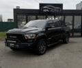 Черный Додж RAM 1500, объемом двигателя 5.7 л и пробегом 102 тыс. км за 49800 $, фото 1 на Automoto.ua