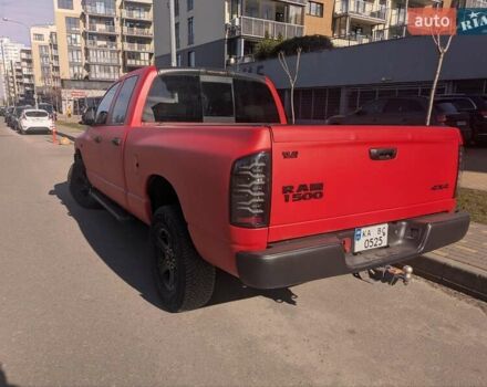 Красный Додж RAM 1500, объемом двигателя 5.7 л и пробегом 290 тыс. км за 15999 $, фото 1 на Automoto.ua