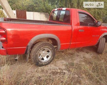 Красный Додж RAM 1500, объемом двигателя 5.7 л и пробегом 65 тыс. км за 9500 $, фото 1 на Automoto.ua