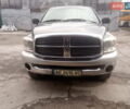 Серый Додж RAM 1500, объемом двигателя 5.7 л и пробегом 238 тыс. км за 12100 $, фото 1 на Automoto.ua