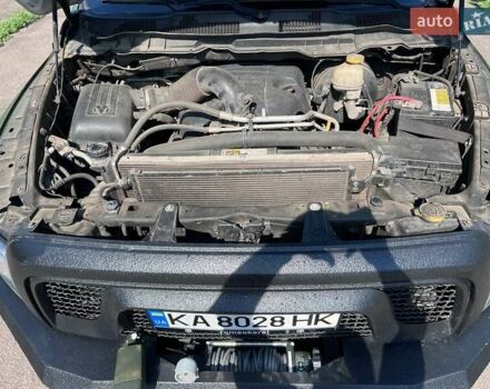 Зеленый Додж RAM 1500, объемом двигателя 5.7 л и пробегом 148 тыс. км за 28500 $, фото 4 на Automoto.ua
