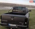 Черный Додж RAM 2500, объемом двигателя 5.7 л и пробегом 214 тыс. км за 16000 $, фото 2 на Automoto.ua