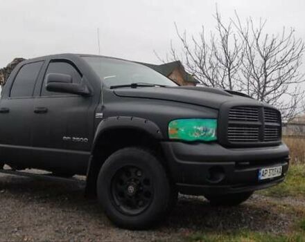 Черный Додж RAM 2500, объемом двигателя 5.65 л и пробегом 300 тыс. км за 15000 $, фото 1 на Automoto.ua