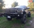 Черный Додж RAM 3500, объемом двигателя 5.9 л и пробегом 160 тыс. км за 18500 $, фото 1 на Automoto.ua