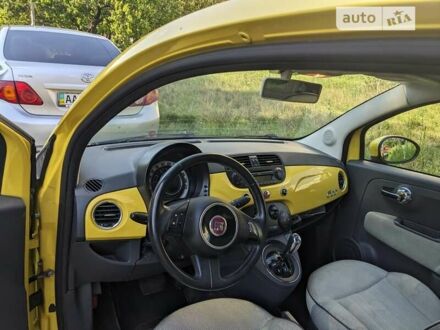 Желтый Фиат 500, объемом двигателя 1.24 л и пробегом 184 тыс. км за 5900 $, фото 1 на Automoto.ua
