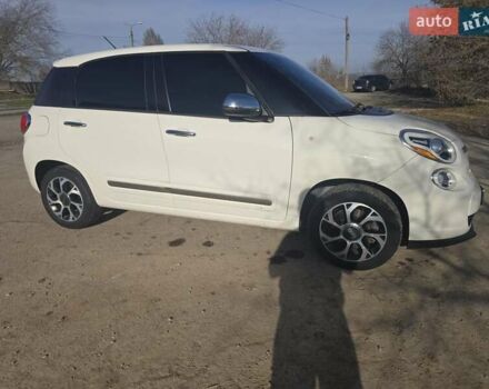 Белый Фиат 500L, объемом двигателя 1.37 л и пробегом 222 тыс. км за 7799 $, фото 26 на Automoto.ua