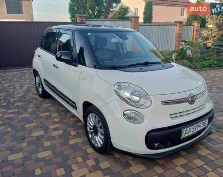 Белый Фиат 500L, объемом двигателя 1.25 л и пробегом 118 тыс. км за 8000 $, фото 1 на Automoto.ua