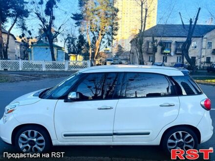 Белый Фиат 500L, объемом двигателя 1.4 л и пробегом 181 тыс. км за 8500 $, фото 1 на Automoto.ua