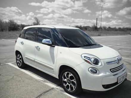 Белый Фиат 500L, объемом двигателя 1.4 л и пробегом 220 тыс. км за 8099 $, фото 1 на Automoto.ua