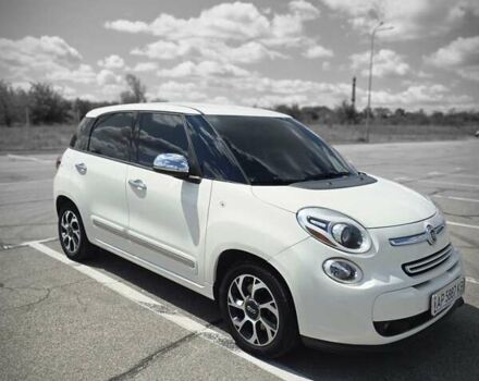 Белый Фиат 500L, объемом двигателя 1.4 л и пробегом 220 тыс. км за 8099 $, фото 1 на Automoto.ua