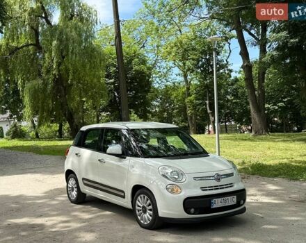 Белый Фиат 500L, объемом двигателя 1.25 л и пробегом 170 тыс. км за 8500 $, фото 1 на Automoto.ua