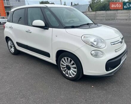 Белый Фиат 500L, объемом двигателя 1.25 л и пробегом 138 тыс. км за 10500 $, фото 1 на Automoto.ua