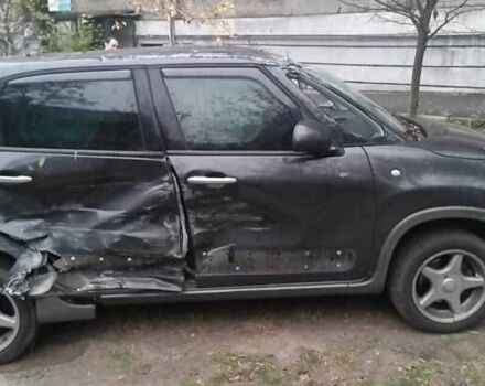 Черный Фиат 500L, объемом двигателя 1.3 л и пробегом 191 тыс. км за 3000 $, фото 2 на Automoto.ua