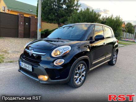 Черный Фиат 500L, объемом двигателя 1.4 л и пробегом 160 тыс. км за 9950 $, фото 1 на Automoto.ua