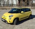 Желтый Фиат 500L, объемом двигателя 1.4 л и пробегом 91 тыс. км за 9100 $, фото 1 на Automoto.ua