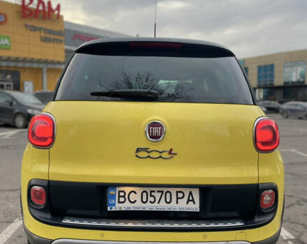 Желтый Фиат 500L, объемом двигателя 1.25 л и пробегом 156 тыс. км за 9850 $, фото 5 на Automoto.ua