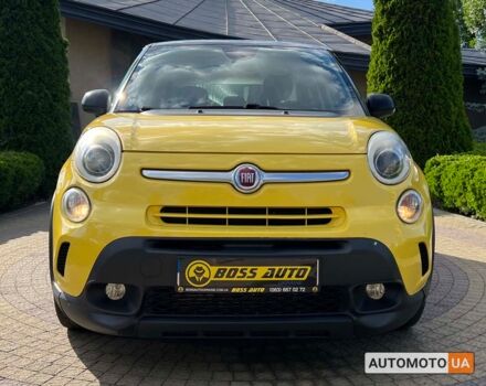 Желтый Фиат 500L, объемом двигателя 1.4 л и пробегом 71 тыс. км за 12800 $, фото 1 на Automoto.ua