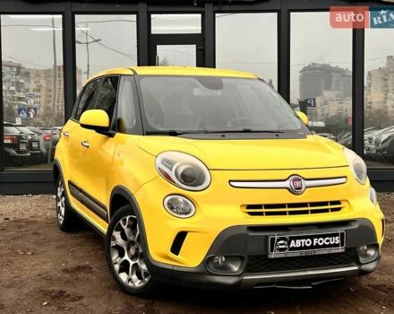 Желтый Фиат 500L, объемом двигателя 1.37 л и пробегом 189 тыс. км за 6890 $, фото 1 на Automoto.ua