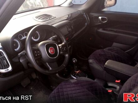 Синий Фиат 500L, объемом двигателя 1.4 л и пробегом 180 тыс. км за 7600 $, фото 1 на Automoto.ua