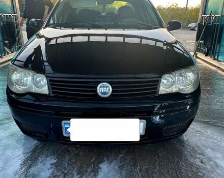 Черный Фиат Альбеа, объемом двигателя 1.4 л и пробегом 320 тыс. км за 3000 $, фото 1 на Automoto.ua