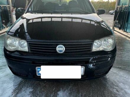 Черный Фиат Альбеа, объемом двигателя 1.4 л и пробегом 320 тыс. км за 3000 $, фото 1 на Automoto.ua