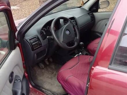 Фіат Альбеа 2006 у Сумах на Automoto.ua Червоний Фіат Альбеа, об'ємом двигуна 1.4 л та пробігом 147 тис. км за 4200 $, фото 1 на Automoto.ua