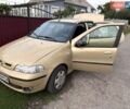 Желтый Фиат Альбеа, объемом двигателя 1.2 л и пробегом 187 тыс. км за 3100 $, фото 1 на Automoto.ua