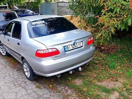 Серый Фиат Альбеа, объемом двигателя 1.4 л и пробегом 172 тыс. км за 3300 $, фото 1 на Automoto.ua