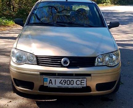 Серый Фиат Альбеа, объемом двигателя 1.4 л и пробегом 200 тыс. км за 1950 $, фото 1 на Automoto.ua