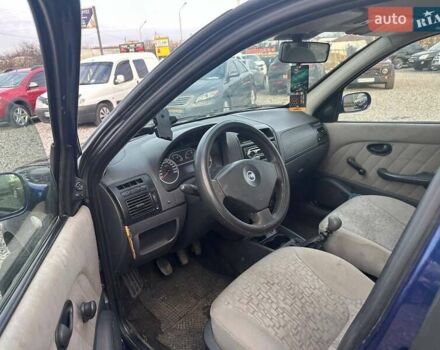 Синий Фиат Альбеа, объемом двигателя 1.37 л и пробегом 255 тыс. км за 3300 $, фото 5 на Automoto.ua