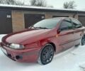 Красный Фиат Брава, объемом двигателя 1.4 л и пробегом 200 тыс. км за 1650 $, фото 1 на Automoto.ua