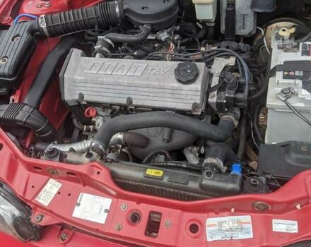 Красный Фиат Брава, объемом двигателя 1.4 л и пробегом 250 тыс. км за 2000 $, фото 2 на Automoto.ua