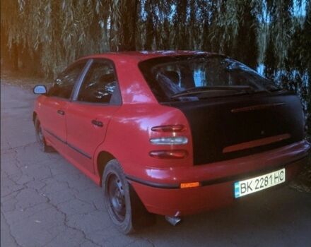 Красный Фиат Брава, объемом двигателя 1.4 л и пробегом 250 тыс. км за 2100 $, фото 1 на Automoto.ua
