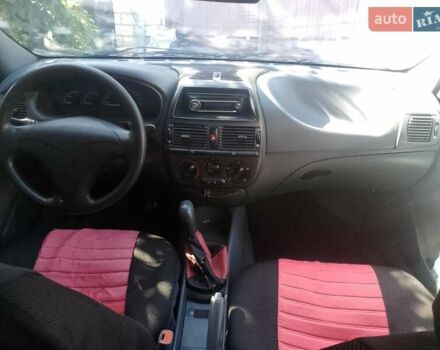 Красный Фиат Брава, объемом двигателя 1.4 л и пробегом 250 тыс. км за 2000 $, фото 4 на Automoto.ua