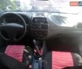 Красный Фиат Брава, объемом двигателя 1.4 л и пробегом 250 тыс. км за 2000 $, фото 4 на Automoto.ua