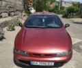 Красный Фиат Брава, объемом двигателя 1.37 л и пробегом 225 тыс. км за 1550 $, фото 1 на Automoto.ua
