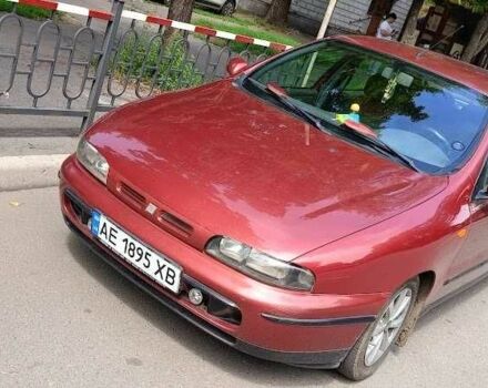Красный Фиат Брава, объемом двигателя 1.6 л и пробегом 188 тыс. км за 1800 $, фото 1 на Automoto.ua