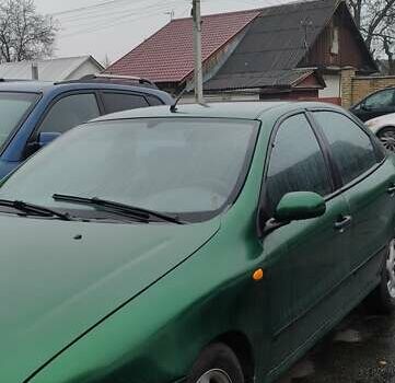 Зеленый Фиат Брава, объемом двигателя 1.4 л и пробегом 284 тыс. км за 1135 $, фото 1 на Automoto.ua