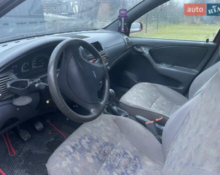 Красный Фиат Браво, объемом двигателя 1.37 л и пробегом 315 тыс. км за 890 $, фото 4 на Automoto.ua