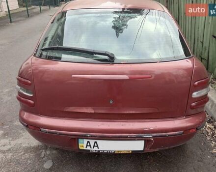 Красный Фиат Браво, объемом двигателя 1.6 л и пробегом 286 тыс. км за 750 $, фото 2 на Automoto.ua